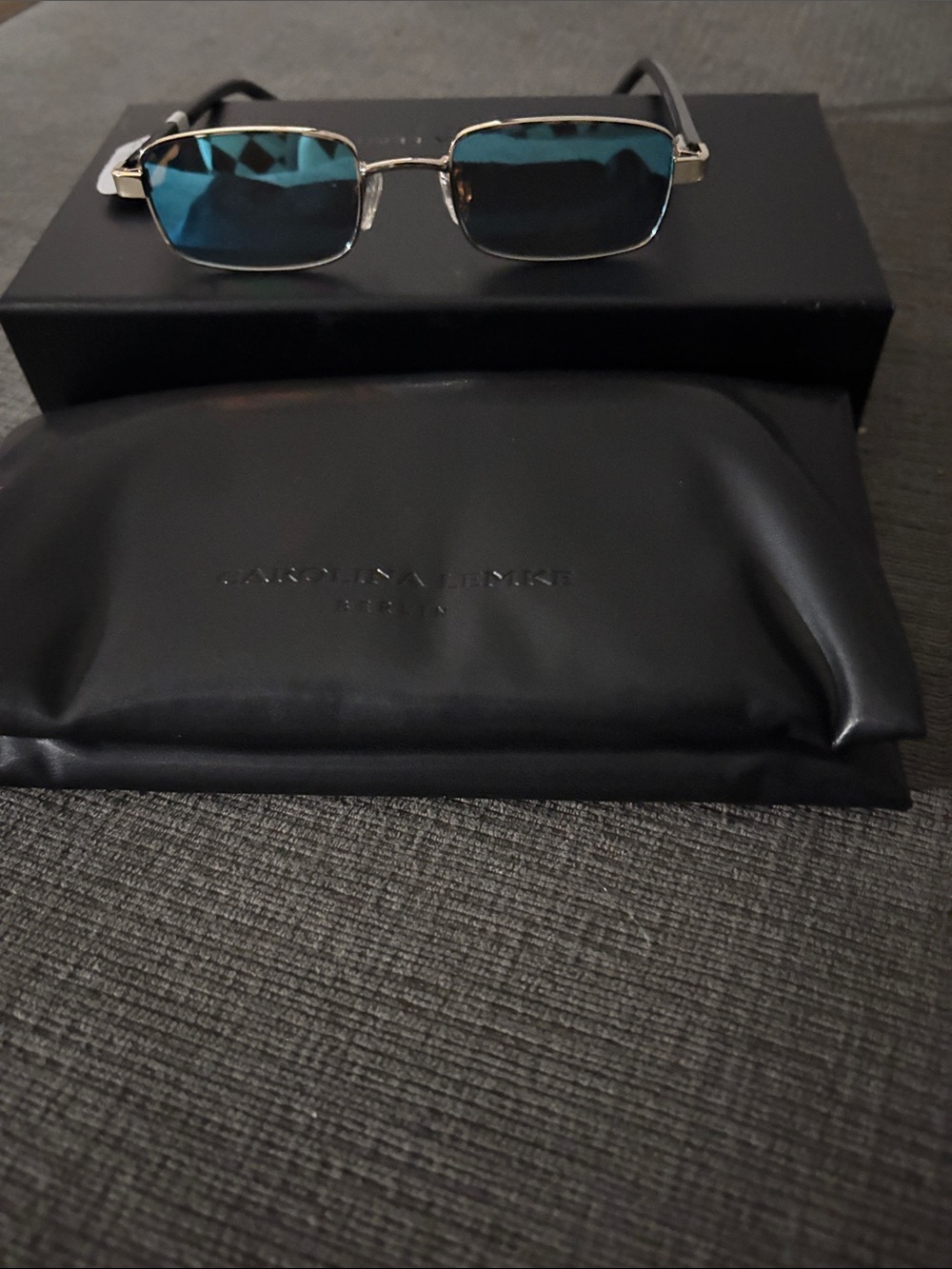 Rectangular Blue Lens Sunglasses with Silver Frame. Carolina Lemke